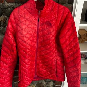 Red North Face light puffer jacket